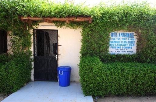 Looking at the doorway to the La maison bleue room where Frank Vandenbroucke was found dead on Monday.