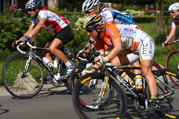 Race leader, Ina Yoko Teutenberg (HTC - Columbia Women) corners at speed in the bunch