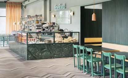 A view of the counter and a table inside Finefood Kärlek och Mat — Stockholm