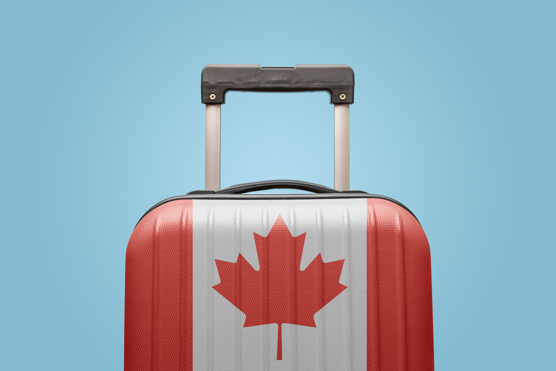 Baggage with Canadian flag printed on the front.