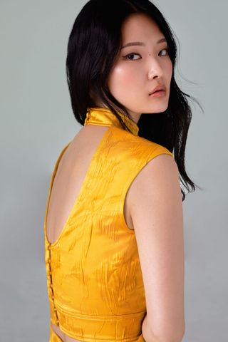 yellow top with open back