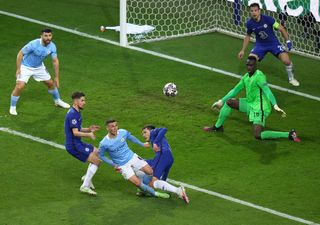 Andreas Christensen (centre) blocks a shot from Phil Foden