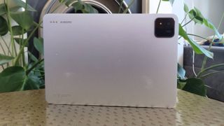 The Xiaomi Pad 7 Pro on a bronze table