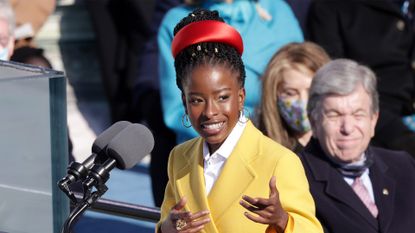 WASHINGTON, DC - JANUARY 20: Youth Poet Laureate Amanda Gorman speaks during the inauguration of U.S. President Joe Biden on the West Front of the U.S. Capitol on January 20, 2021 in Washington, DC. During today's inauguration ceremony Joe Biden becomes the 46th president of the United States. (Photo by Alex Wong/Getty Images)