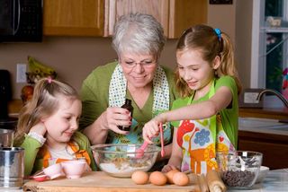 Grandma baking with grandkids.