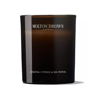 Molton Brown Coastal Cypress & Sea Fennel Signature Candle in amber glass jar