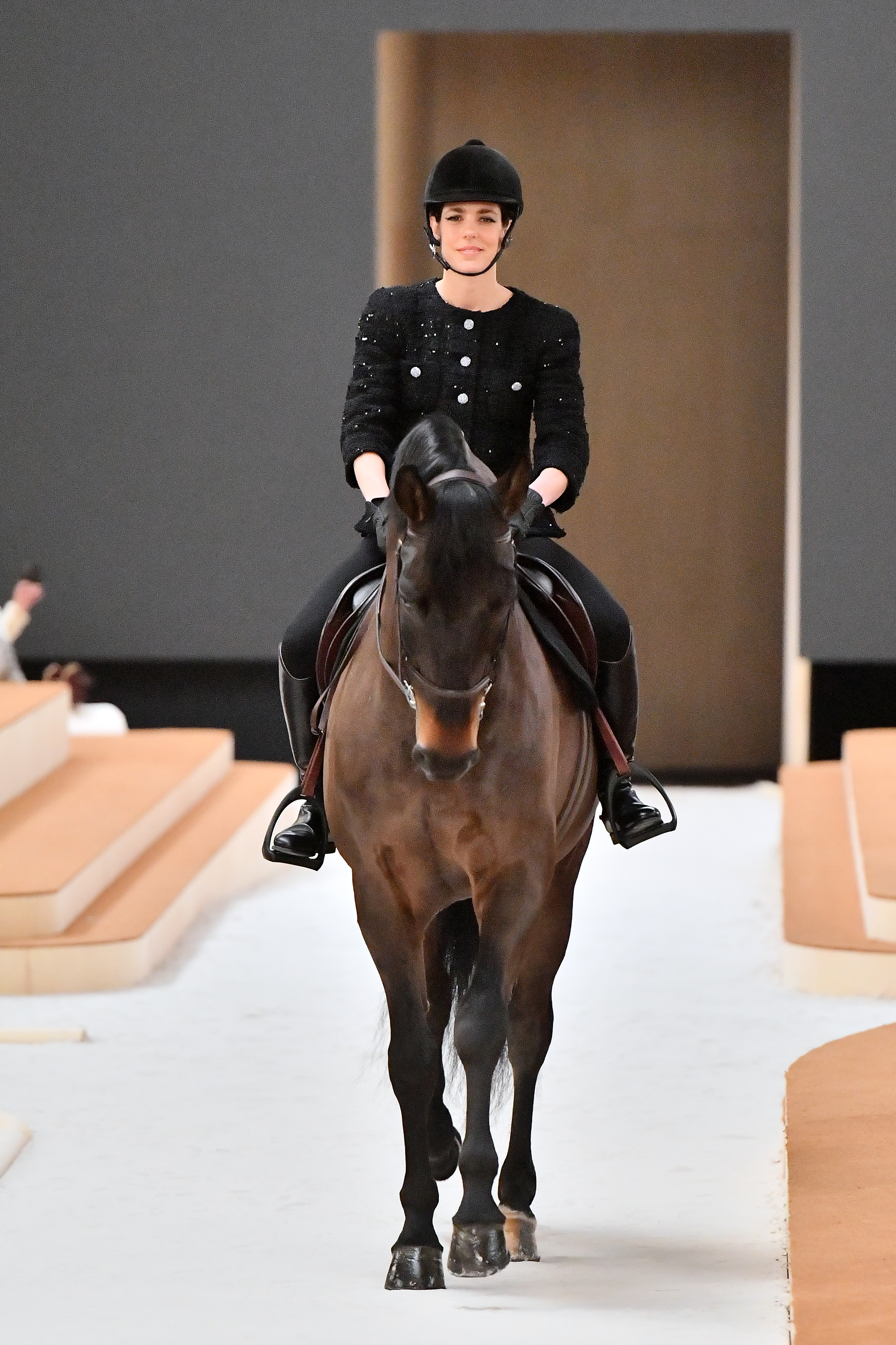 Charlotte Casiraghi rides a horse on the runway during the Chanel Haute Couture Spring/Summer 2022 show as part of Paris Fashion Week at Le Grand Palais Ephemere on January 25, 2022 in Paris, France. (Photo by Dominique Charriau/WireImage)