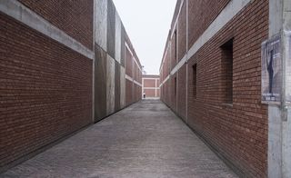 A view down between two red-brick buildings