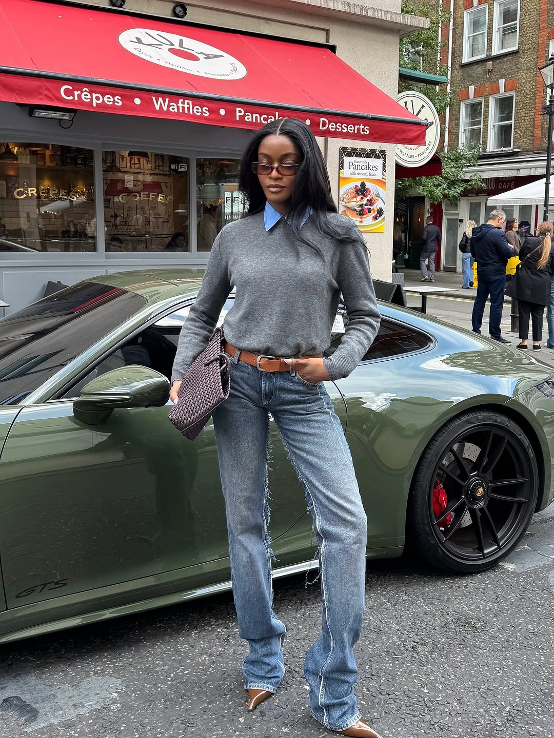 woman wearing gray sweater spring outfit 2026