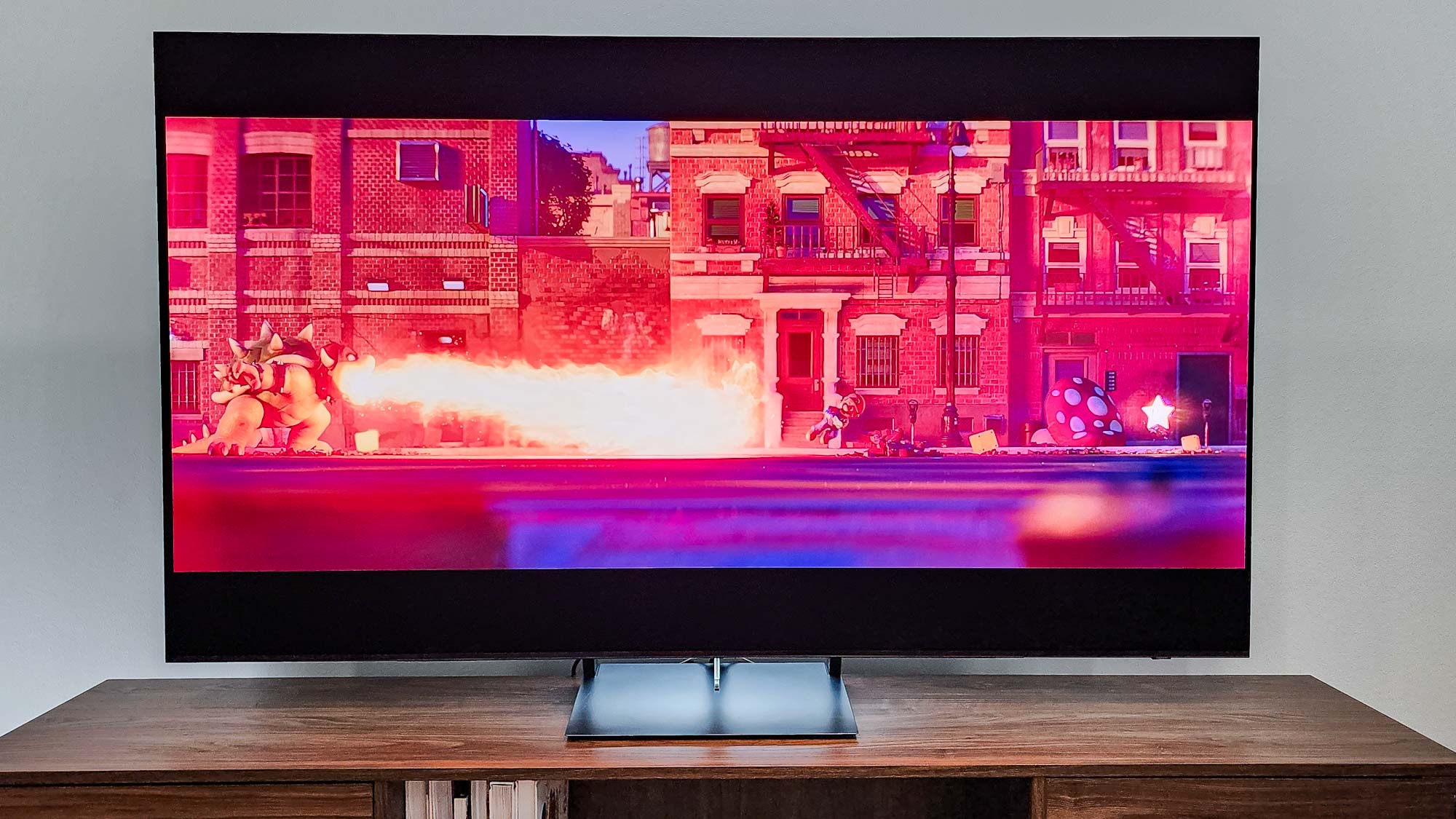 Samsung OLED S90C on desk in living room