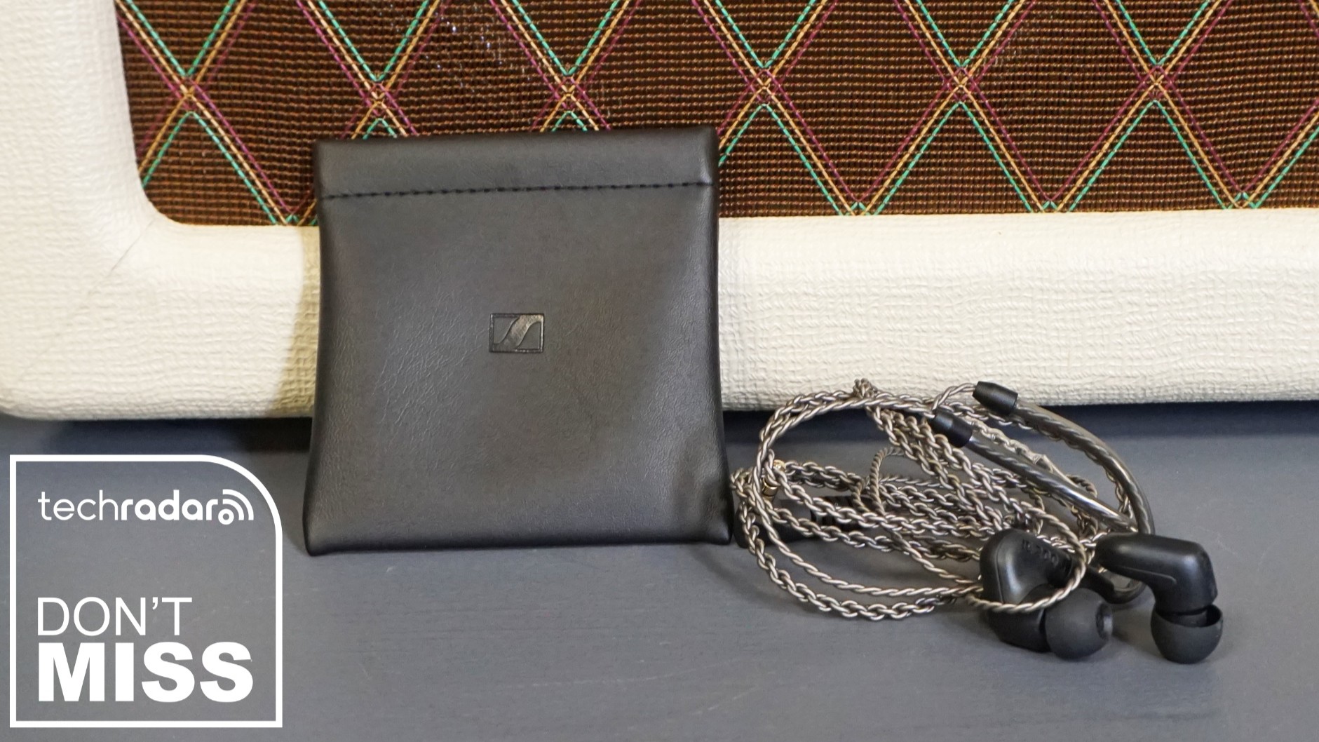 Sennheiser IE 200 IEMs alongside case with the words 'TechRadar: don't miss'