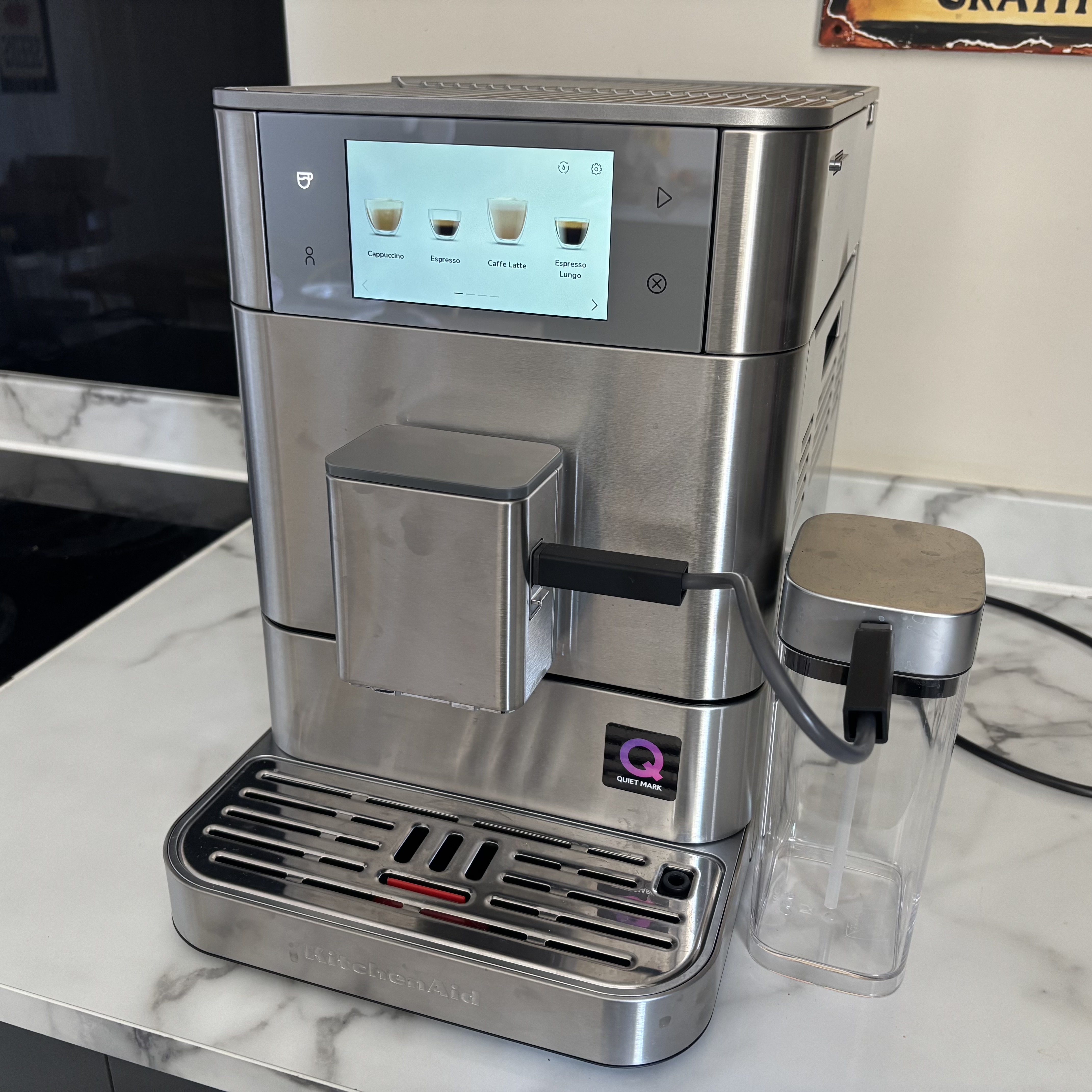 The KitchenAid Fully Automatic Espresso Machine KF8 on a kitchen countertop.