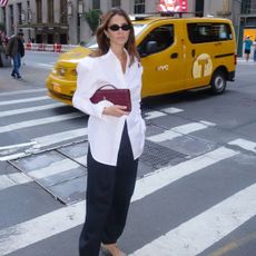 @jen_wonders outfit photo white button down shirt, burgundy bottega veneta clutch