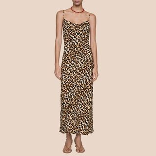 Flat lay image of woman wearing leopard print dress