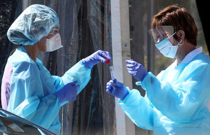 Two nurses test for coronavirus in California.