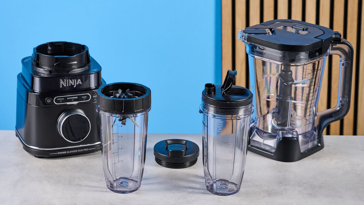 the ninja detect power pro with blendsense, a powerful blender with removable blades, a personal blender attachment, and control dial photographed against a blue background