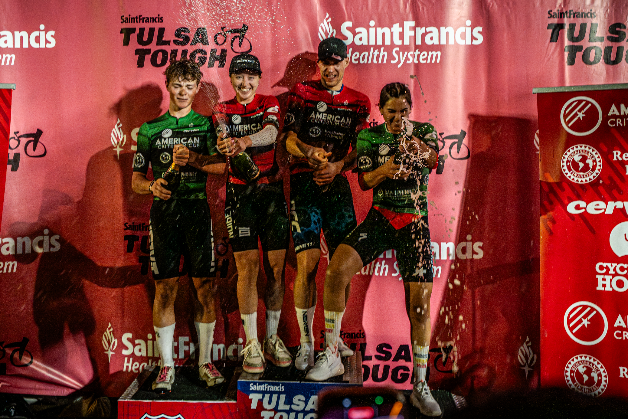 American Criterium Cup podium after 2026 McNellie’s Group Blue Dome Criterium at Tulsa Tough weekend, race winners Skylar Schneider and Dario Rapps in red leader's jerseys