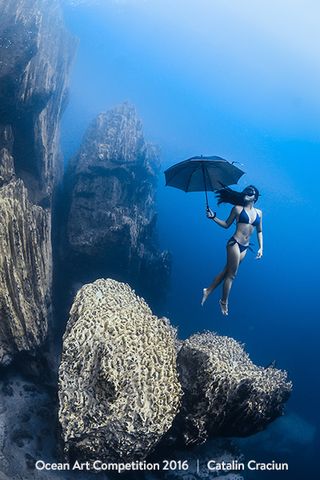 Mary Jane Paula, a free-diving instructor and the deepest Filipina freediver, poses in this whimsical shot by Catalin Cracium. The photo won the novice DSLR category in the 2016 Ocean Art Competition.