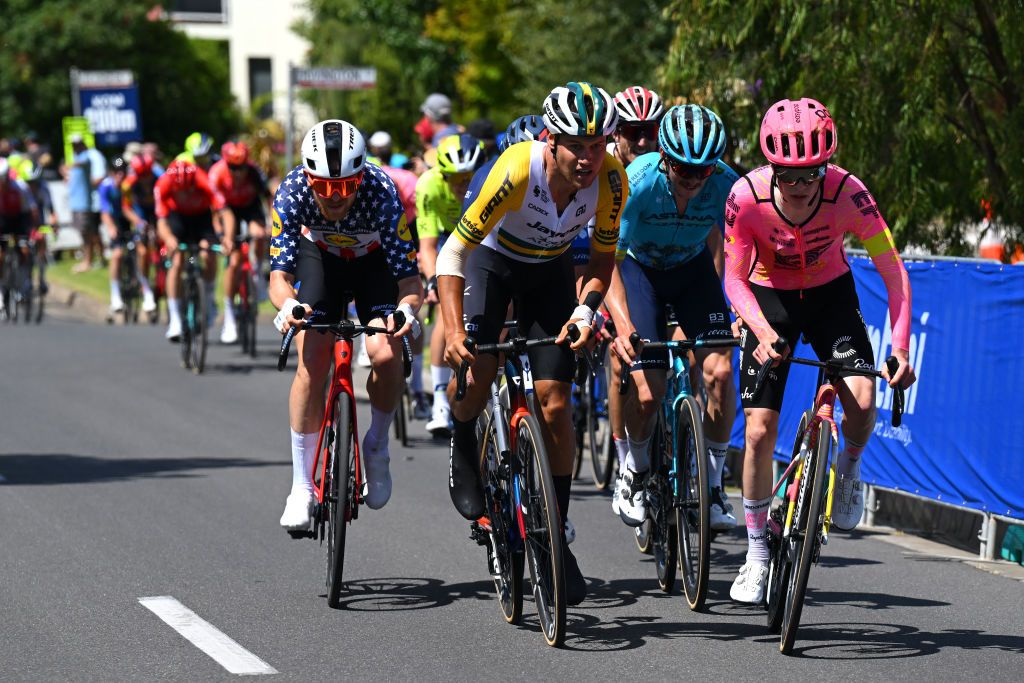 Quinn Simmons (Lidl-Trek), Luke Plapp (Jayco-AlUla) and Archie Ryan (EF Education-Easypost) accelerate at the front