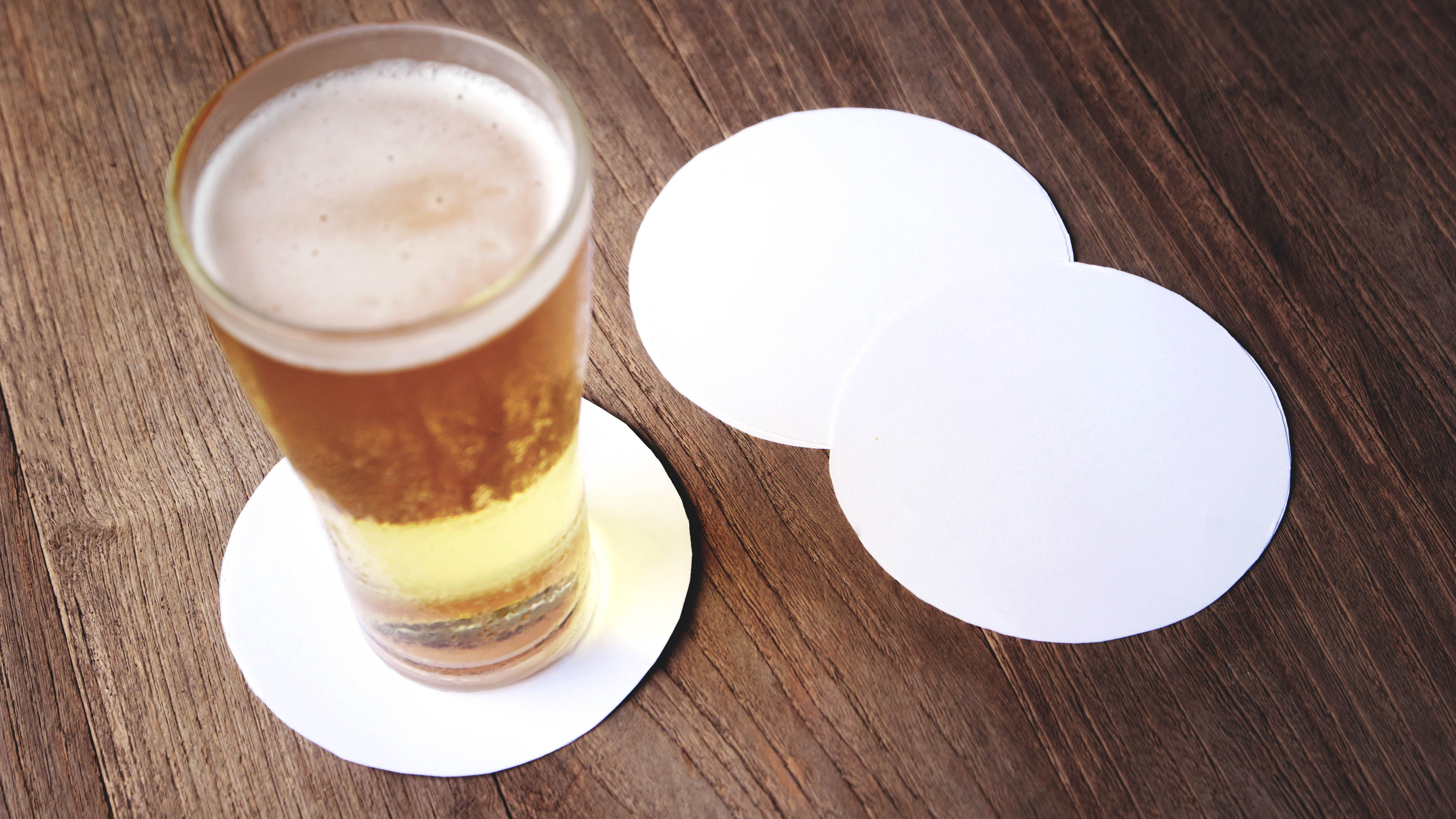 Drink coasters on wooden table