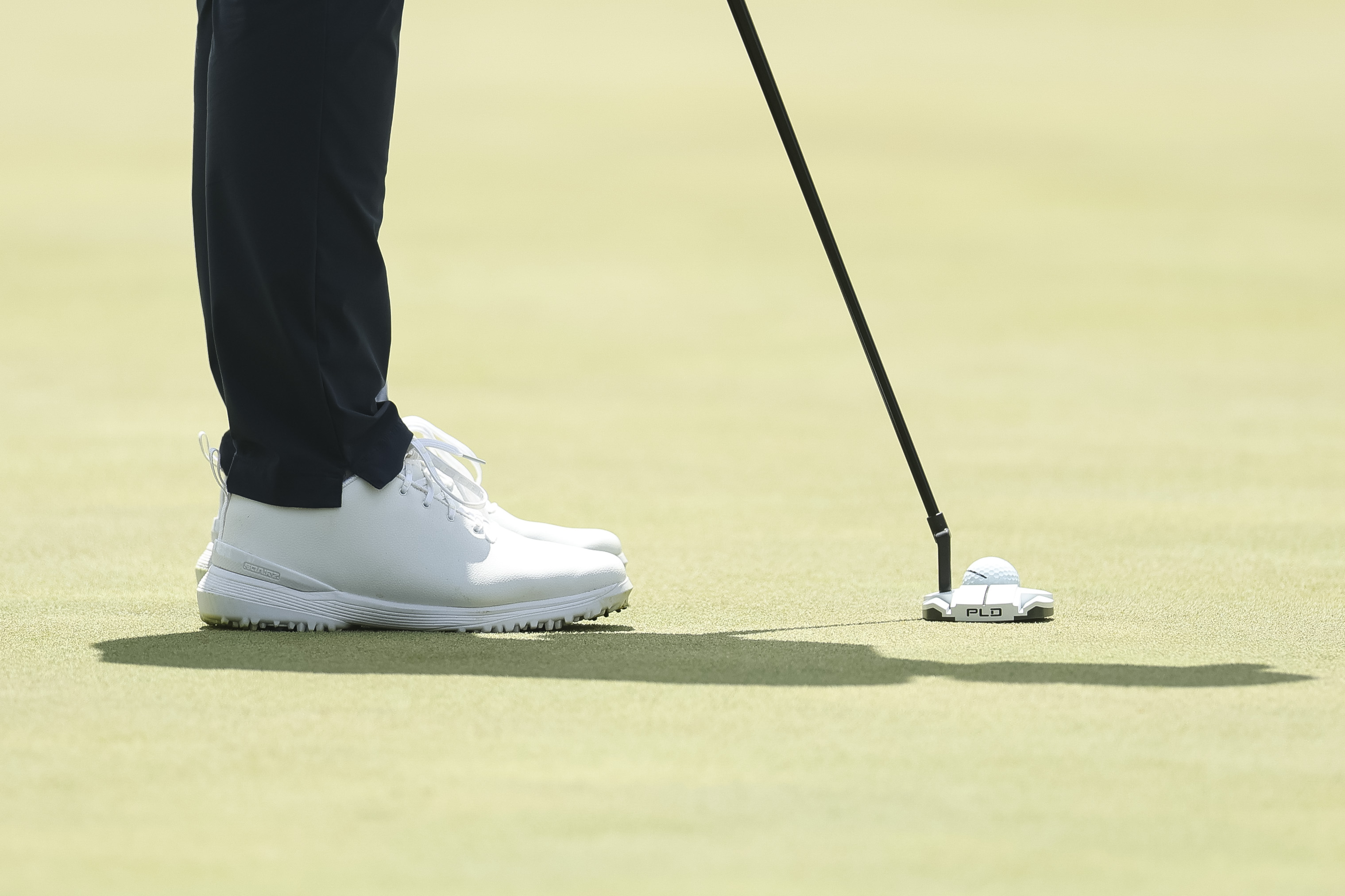 A detailed view of the shoes worn by Kristoffer Reitan of Norway on the 18th green during the first round of the PGA Championship at Aronimink Golf Club