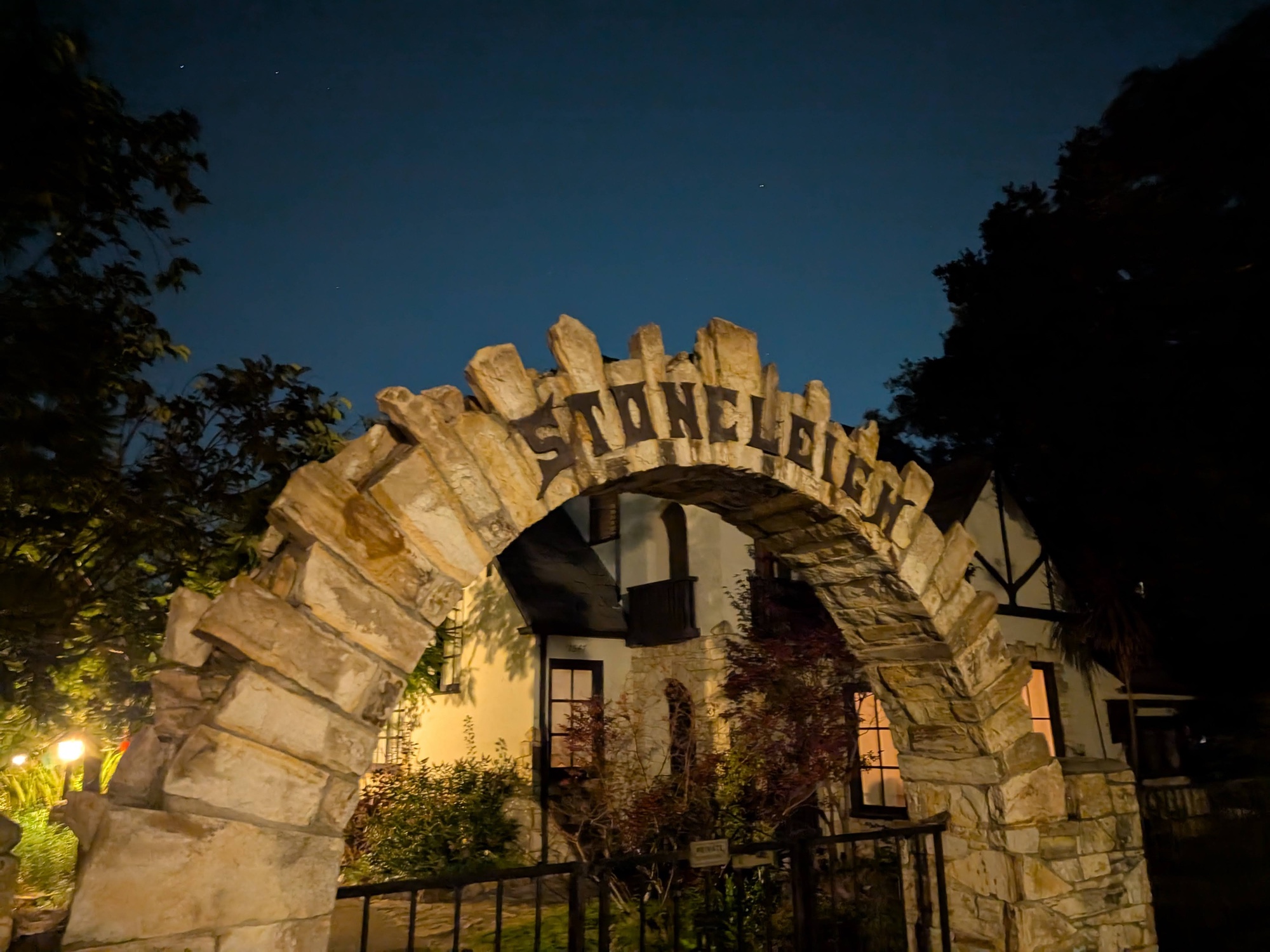 lettering on an archway at night photographed by Pixel 9 Pro