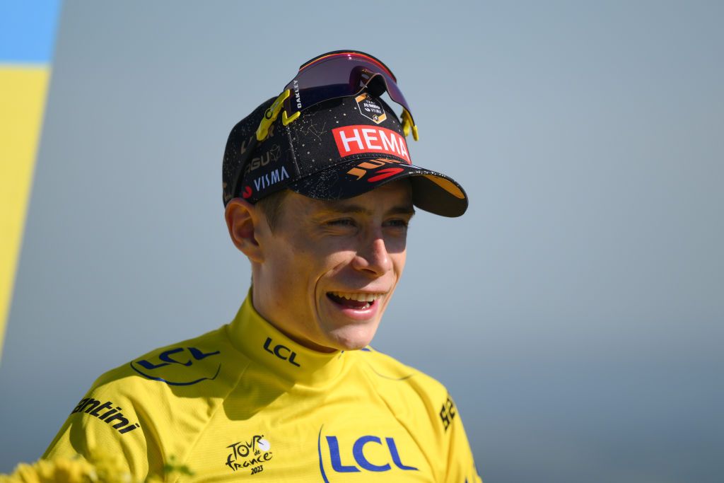 PUY DE DME FRANCE JULY 09 Jonas Vingegaard of Denmark and Team JumboVisma Yellow Leader Jersey celebrates at podium during the stage nine of the 110th Tour de France 2023 a 1824km stage from SaintLonarddeNoblat to Puy de Dme 1412m UCIWT on July 09 2023 in Puy de Dme France Photo by David RamosGetty Images