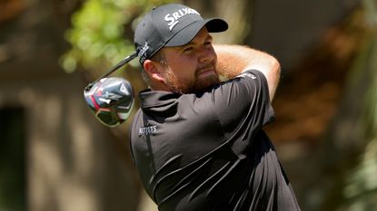 Shane Lowry plays a tee shot during the final round of the 2022 RBC Heritage