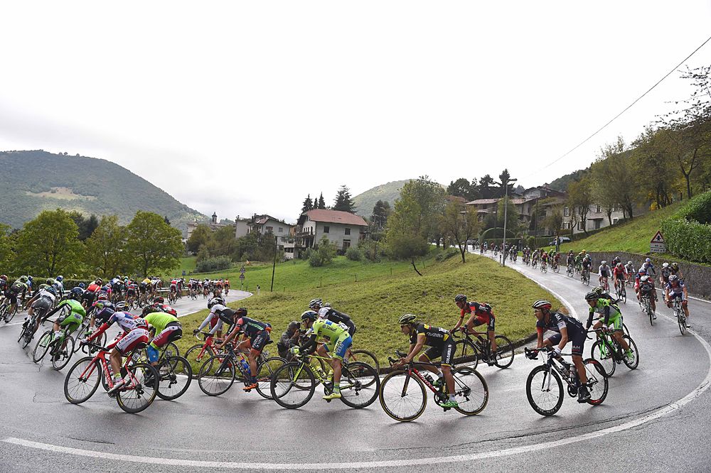 The peloton negotiating one of many twists and turns on route at the Tour of Lombardy