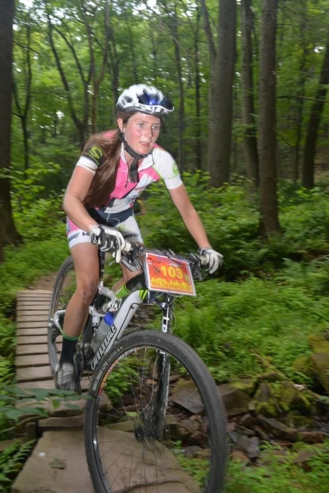 Vicki Barclay rolls three bridges early on the course in 2nd place behind Kathleen Harding (Team CF)