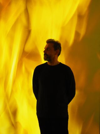 Portrait of Ugo Rondinone with his new film installation, Burn to Shine at the Petit Palais