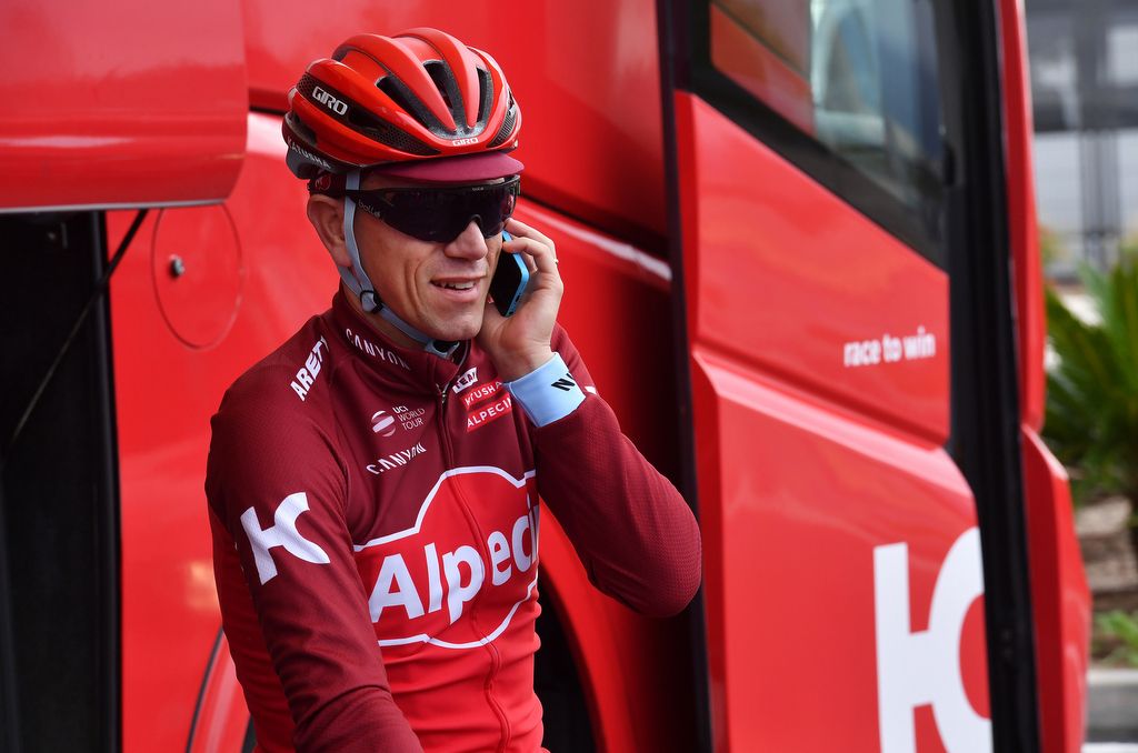 Katusha-Alpecin GM Jos&eacute; Azevedo works the phones