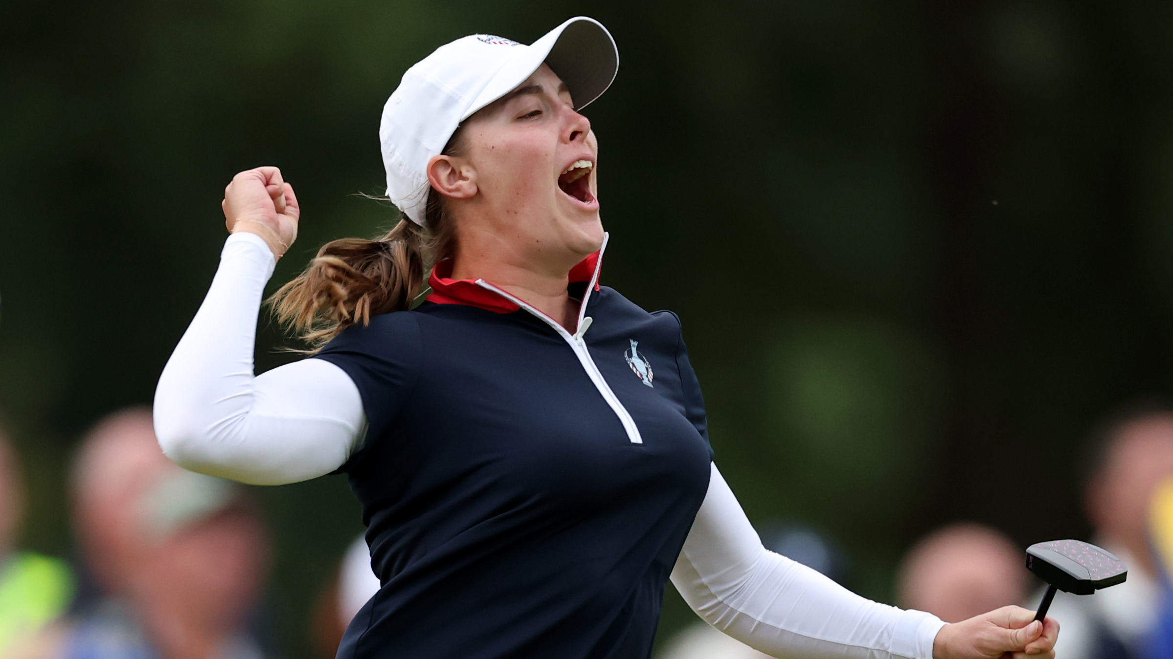 Jennifer Kupcho celebrates winning a point for the US at the Solheim Cup                