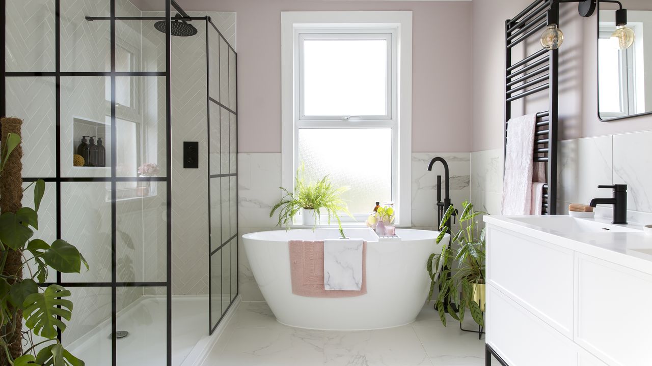 White and pink bathroom with bath and crittall shower