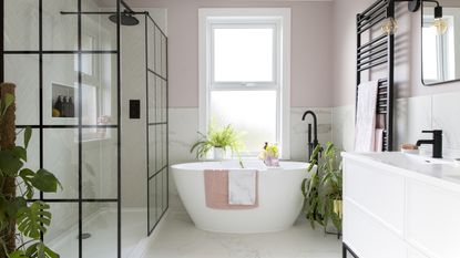 White and pink bathroom with bath and crittall shower