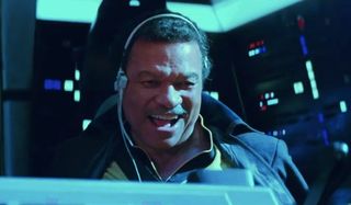 Star Wars: The Rise of Skywalker Lando smiling at the controls of the Falcon