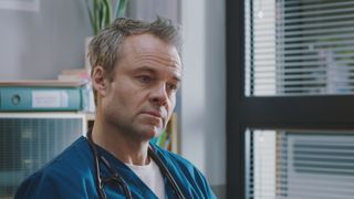 Patrick Onley looking scathingly at Rash in Casualty.