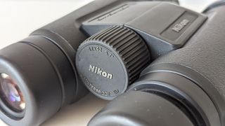 Nikon Monarch M5 12x42 binoculars on a white table