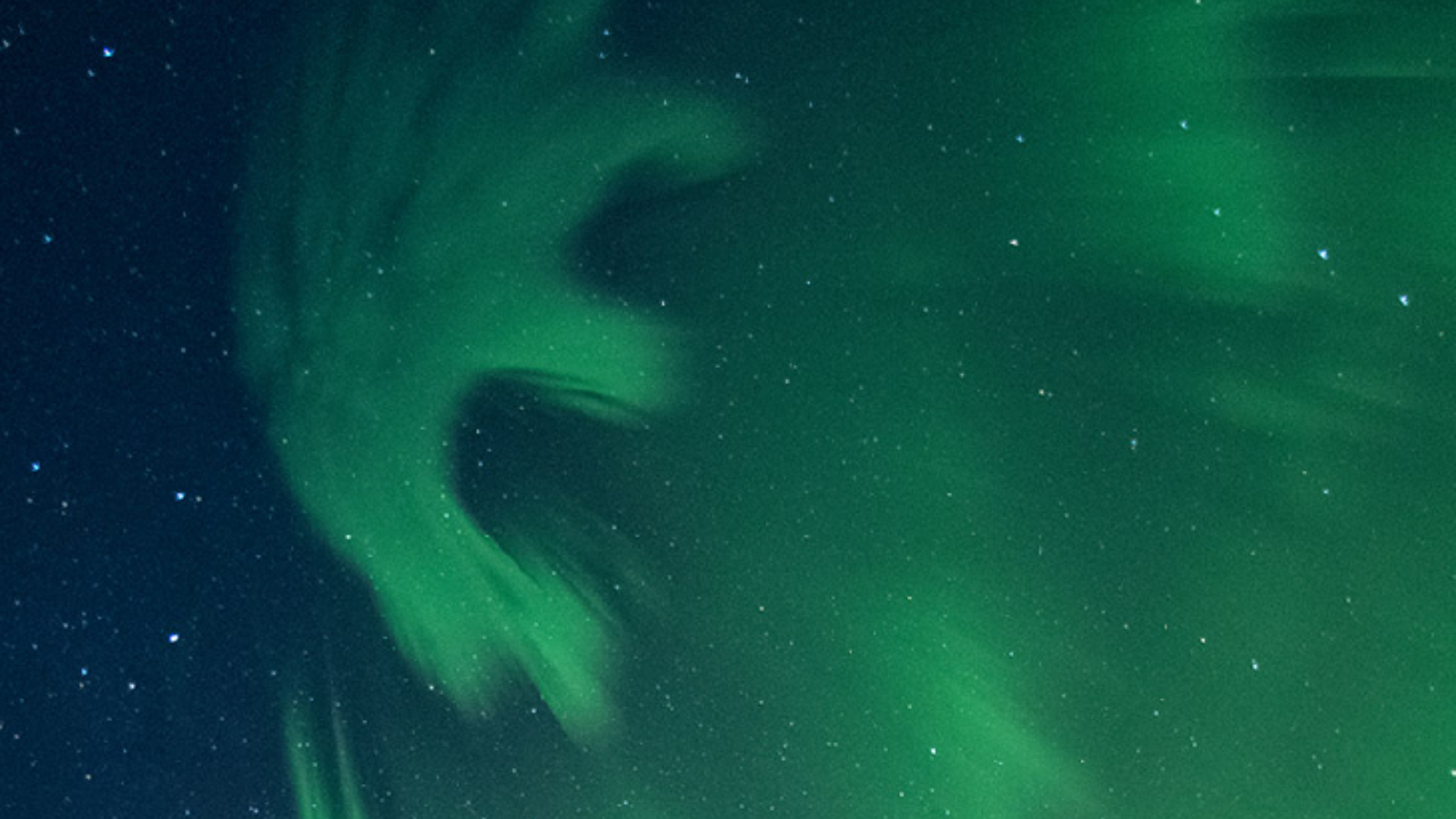 Extraordinarily uncommon, black ‘anti-auroras’ paint luminous ‘letter E’ above Alaska