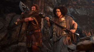 Durin and Disa holding up their weapons.