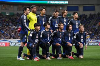 SAITAMA, JAPAN - MARCH 20: Japanese players pose for photographers as they qualified for the World Cup 2026 during the FIFA World Cup Asian qualifier Group C match between Japan and Bahrain at Saitama Stadium on March 20, 2025 in Saitama, Japan. (Photo by Kaz Photography/Getty Images)