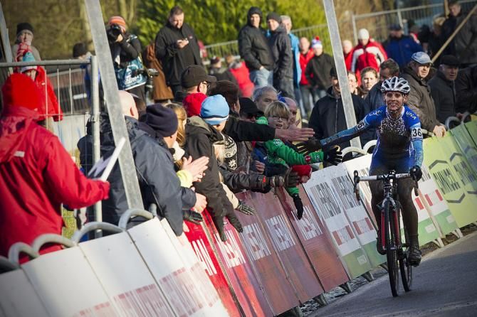 Nash celebrates her win with the crowds in Baal