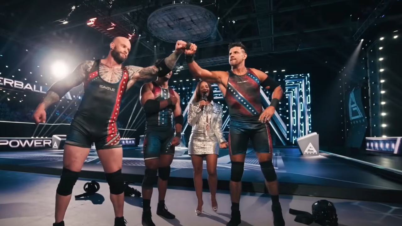 two American Gladiators fist bumping