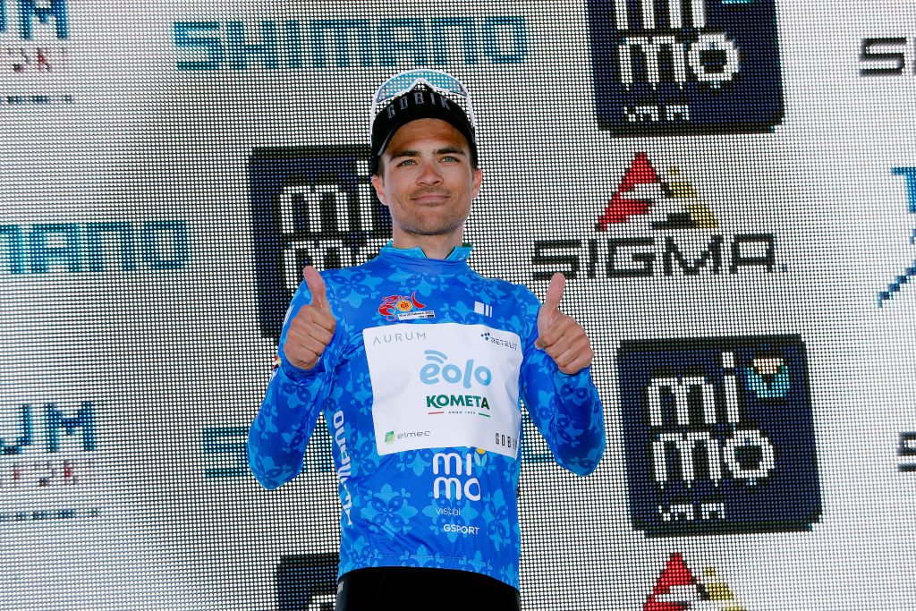 ALCALA LA REAL SPAIN FEBRUARY 17 Diego Pablo Sevilla of Spain and EoloKometa Cycling Team celebrates at podium as Blue Intermediate Sprint Jersey winner after the 68th Vuelta A Andalucia Ruta Del Sol 2022 Stage 2 a 1506km stage from Archidona to Alcal La Real 982m 68RdS on February 17 2022 in Alcala la Real Spain Photo by Bas CzerwinskiGetty Images