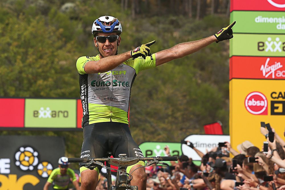 Matthys Beukes of PYGA Euro Steel celebrates as he and partner Philip Buys win stage 5 of the 2019 Absa Cape Epic