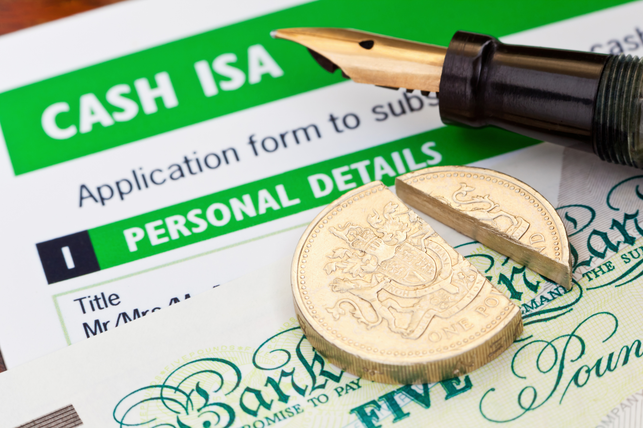 Cash on top of the application form for a cash ISA