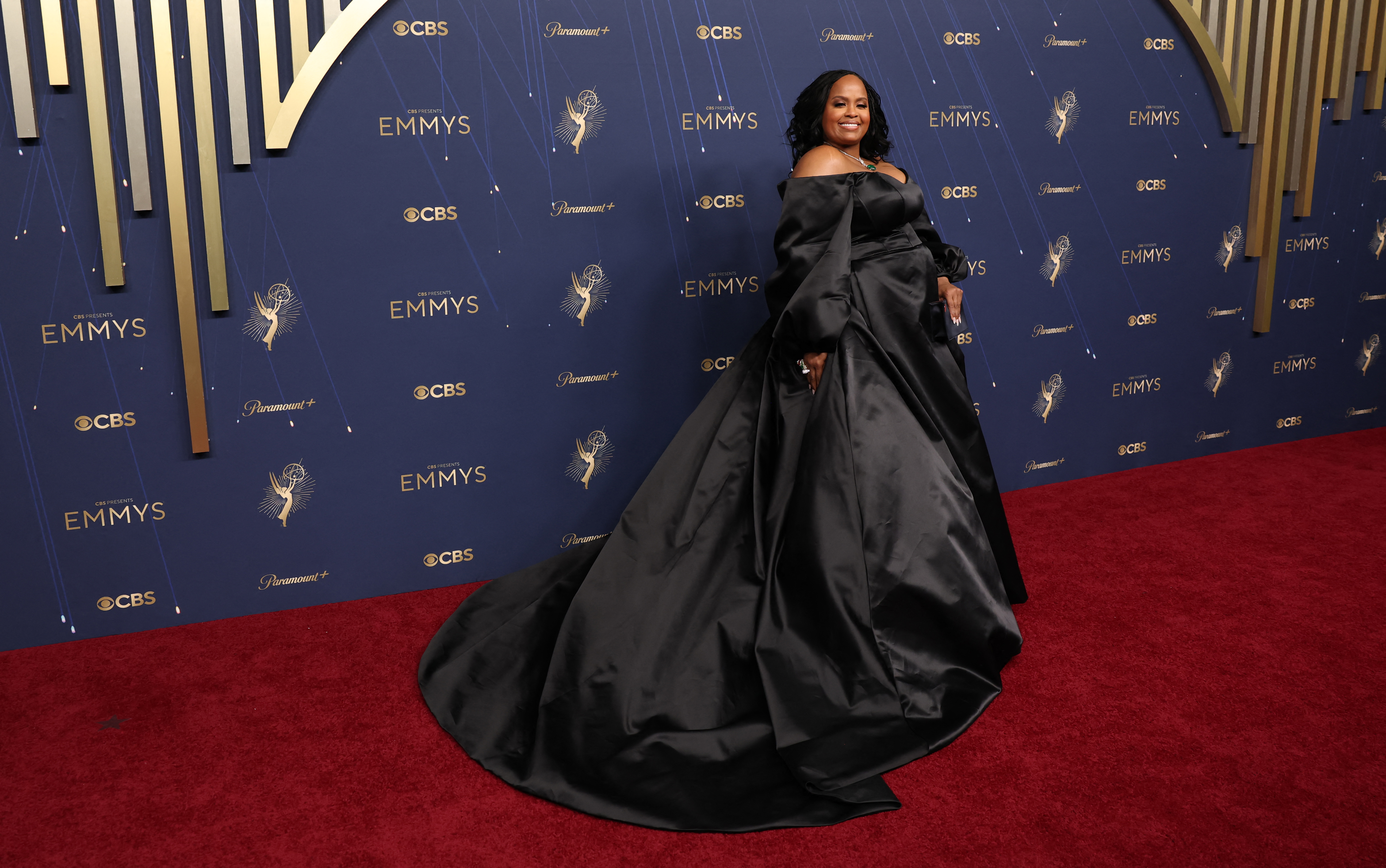Natasha Rothwell 2025 emmy awards wearing a black dress