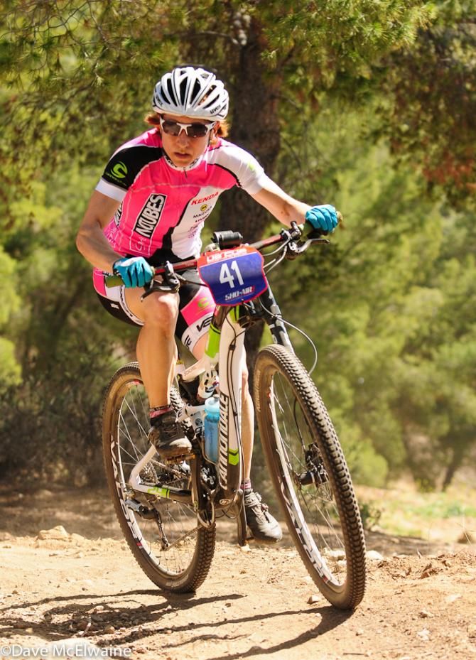 Nina Baum (Stans No Tubes) emerging from the woods on lap two