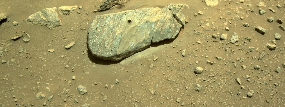 This composite of two images shows the hole drilled by NASA&#039;s Perseverance rover into a rock dubbed “Rochette” during its second sample-collection attempt. The photos were obtained by one of the rover&#039;s navigation cameras on Sept. 1, 2021.