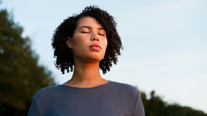 woman breathing cyclic sighing